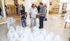 الهلال الاحمر وزع مساعدات على 400 اسرة سورية بالبقاع الأوسط 