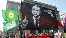 حزب العمال الكردستاني رفع صورة تحرض على قتل أردوغان أمام برلمان سويسرا