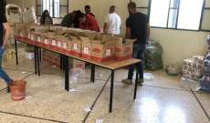 القومي والنهضة النسائيّة والرعاية الصحيّة يوزعون أغذية بالنبي عثمان