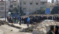 خروج 8 حافلات من حي الوعر في حمص تقل عدد من السكان بينهم 110 مسلح