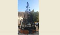 إحراق شجرة الميلاد في ساحة كنيسة مار جاورجيوس في الميناء- طرابلس