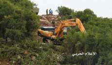 جرافات إسرائيلية تجرف وتقتلع مئات أشجار السنديان بموازاة السياج التقني