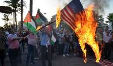 وقفة استنكارية في صيدا ضد مؤتمر البحرين وحرق العلمين الاميركي والاسرائيلي