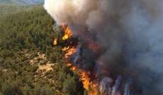 حريق كاليفورنيا انتشر بوتيرة أقل في ظل رياح عاتية