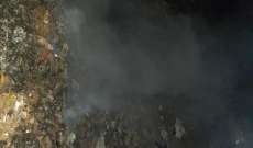 الدفاع المدني: إخماد حريقي أكوام من النفايات في المكلس والدورة