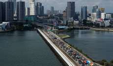 إعادة فتح معبر حدودي مزدحم بين سنغافورة وماليزيا أمام المطعمين ضد 