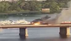 إندلاع حريق بقطار أميركي أثناء عبوره جسرًا وعلى متنه حوالي 200 راكب