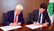 توقيع اتفاقية بين وزير الاعلام ومدير مكتب 