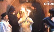 فيض النور المقدس من قبر المسيح في كنيسة القيامة بالقدس