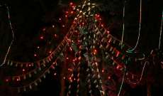 اضاءة شجرة الميلاد في ساحة كنيسة القديس بروفيروس وسط مدينة غزة