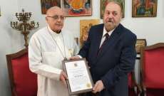 المطران درويش تلقى شهادة راعي حوار الأديان والحضارات العالمية من منظمة اويسكو