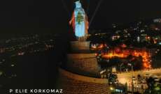 إضاءة مزار سيدة لبنان بحريصا بالعلم اللبناني تضامناً مع اللبنانيين بحربهم على الكورونا