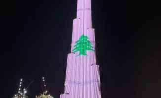 إضاءة برج خليفة بالعلم اللبناني خلال احتفالات ليلة رأس السنة