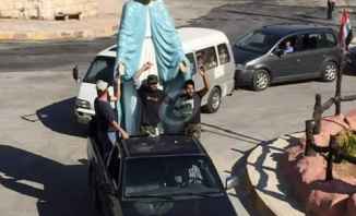 إعادة تمثال العذراء الى مكانه في بلدة معلولا بتوجيه من الرئيس الأسد