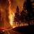 حريق غابات هائل يجتاح مدينة سياحية بكندا والأمطار تساعد رجال الإطفاء