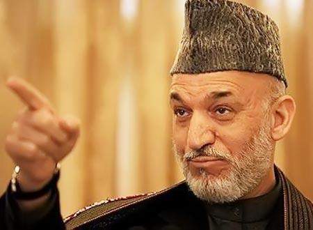 كرزاي هنّأ مرشحي الانتخابات الأفغانية على اتفاق تشكيل حكومة وحدة