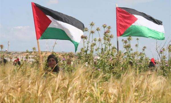 النشرة: الفلسطينيون يحيون &quot;يوم الأرض&quot; في غزة والضفة والداخل الفلسطيني