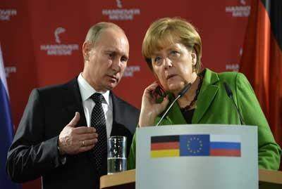 بوتين وميركل وبوروشينكو بحثوا عبر الهاتف تسوية الوضع في شرق أوكرانيا
