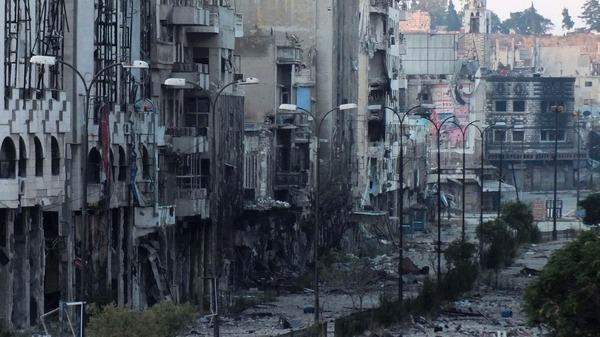 التلفزيون السوري ينفي اتفاقا لخروج 213 مسلحا من مدينة المعضمية