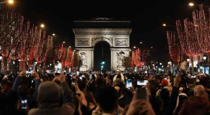 إحتفالات محدودة في باريس ومدريد وسط اجراءات للحد من انتشار كورونا