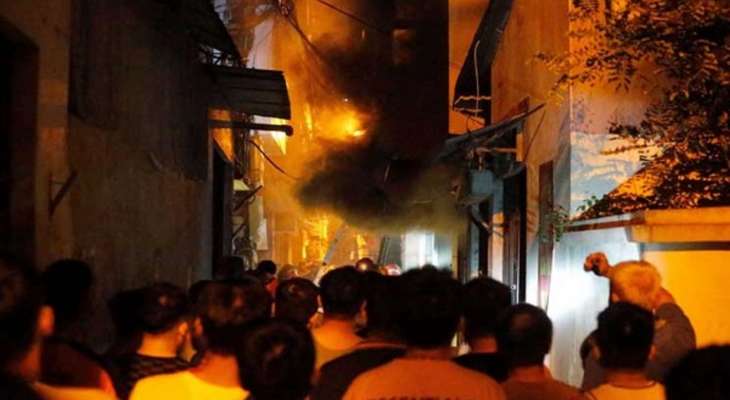 مقتل 14 شخصاً على الأقلّ في حريق بمبنى في وسط هانوي