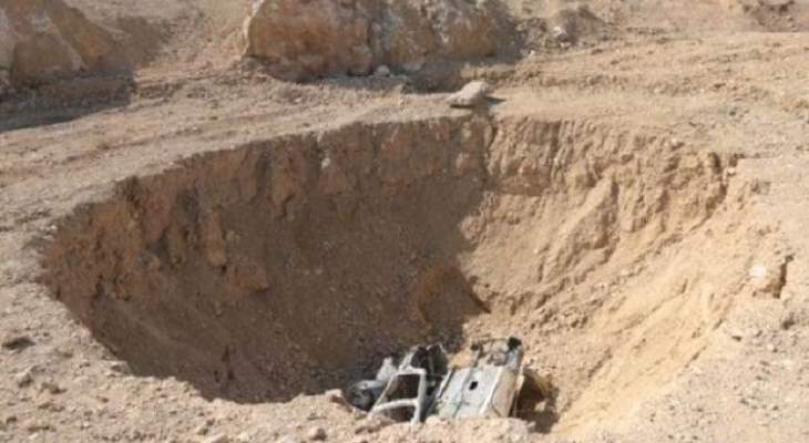التليغراف: الكشف عن أكبر مقبرة تضم قوافل ابادها &quot;داعش&quot; على طريق الموصل