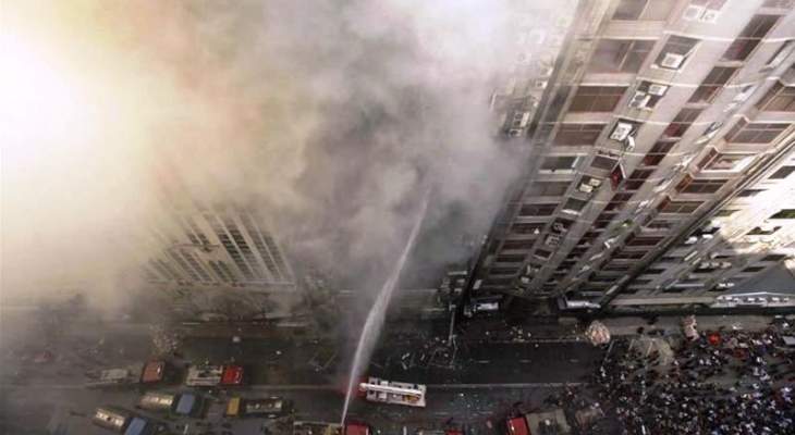 سقوط 19 قتيلا جراء حريق برج تجاري في بنغلادش
