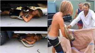 شاب ينقذ أفعى ضخمة من محرك سيارة في استراليا