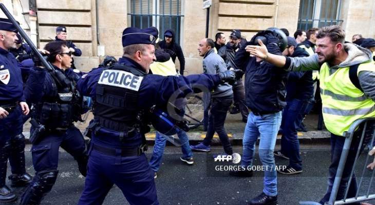 مواجهات بين الشرطة الفرنسية وعمال &quot;توتال&quot; المفصولين في باريس