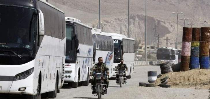 وصول 50 حافلة تقل مسلحي فصيل جيش الإسلام وأهالي دوما إلى ريف حلب