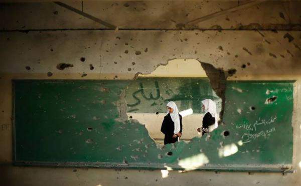 طلبة غزة يبدأون عامهم الدراسي بفقدان زملائهم ومدارسهم المدمرة 