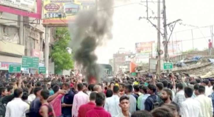 Trains burned in India as protests rage against new draft system