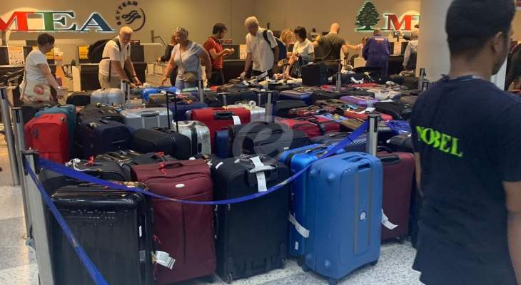 النشرة: توقف أحزمة نقل الحقائب في المطار عن العمل