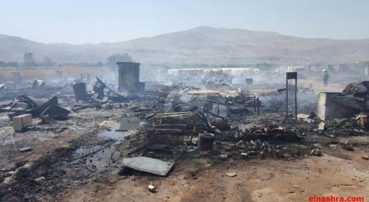 &quot;التايمز&quot;: سوريون يفرون بعدما أضرم السكان النار في مخيم المنية للاجئين