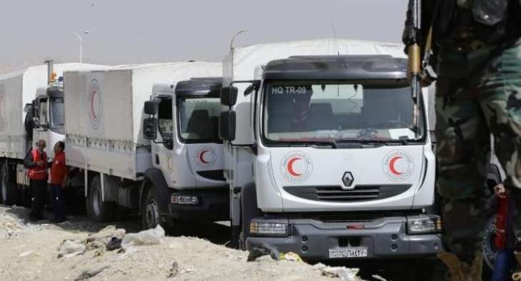 الصليب الأحمر:قافلة تضم 13 شاحنة تستعد للدخول إلى الغوطة وتسليم مساعدات