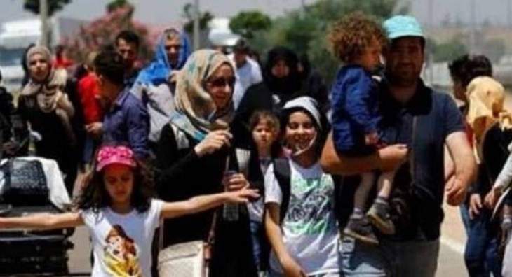وصول مئات النازحين العائدين من لبنان إلى جديدة يابوس تمهيدا لنقلهم إلى