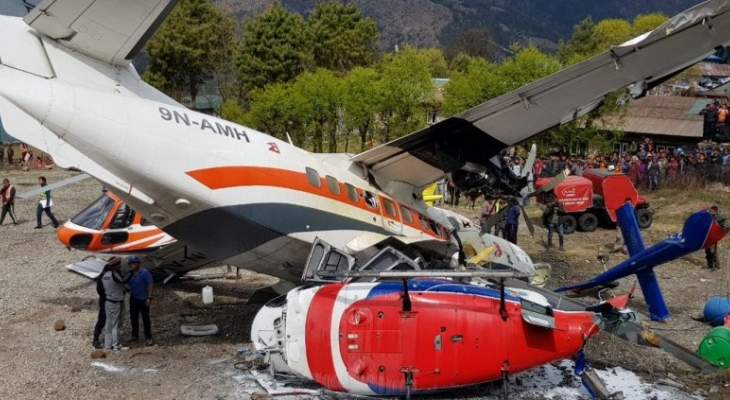مقتل شخصين وإصابة 5 آخرين إثر اصطدام طائرة بمروحية بمطار لوكلا بنيبال