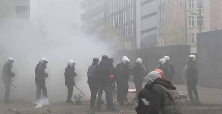 اشتباكات بين المتظاهرين والشرطة في بروكسل احتجاجا على قانون الهجرة
