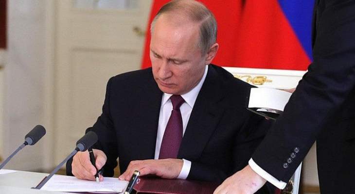 بوتين وقّع قانونا يسهل حصول سكان دونيتسك ولوغانسك على الجنسية الروسية