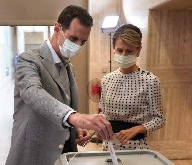 الأسد وزوجته أدليا بصوتيهما في انتخابات مجلس الشعب